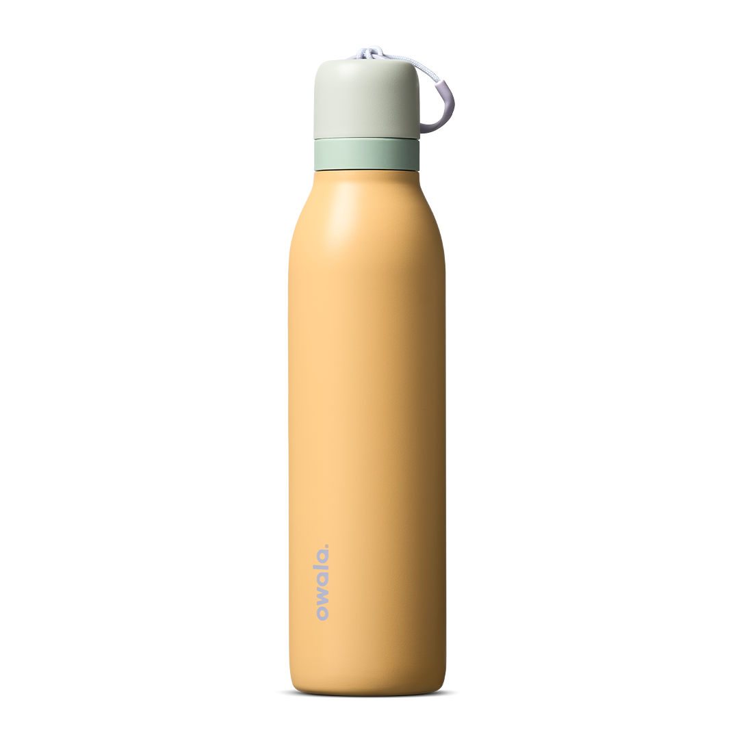 FreeSip Twist 24oz, coral pink body with orange-red lid and purple band; slim insulated bottle
